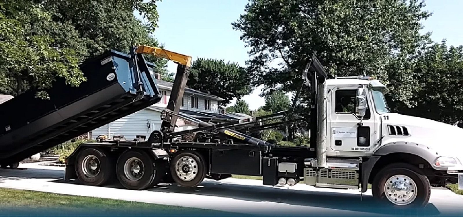 Roll-off dumpster delivery in Lubbock TX residential neighborhood