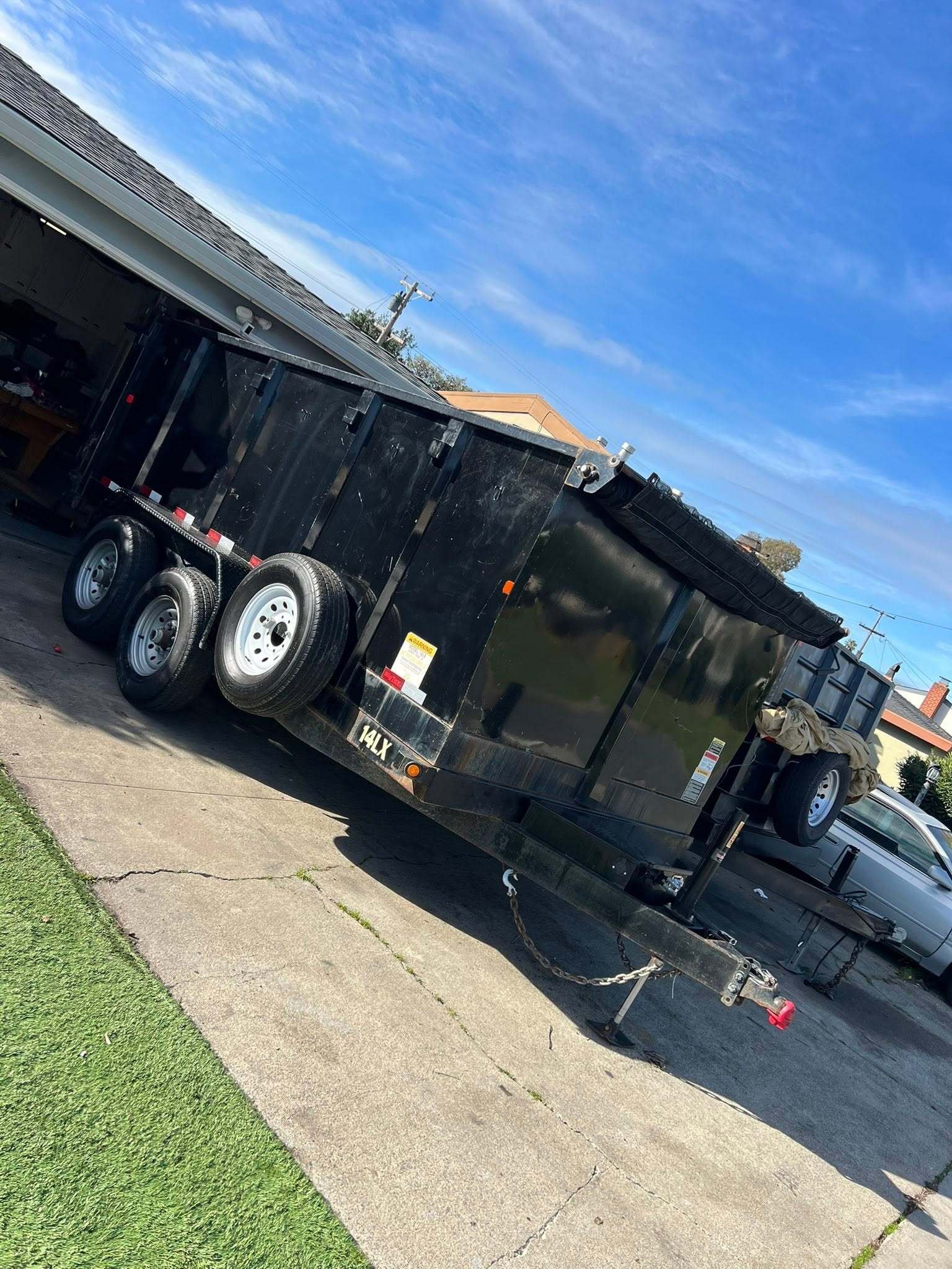 Residential garage cleanout South Lubbock TX 14 yard dumpster